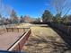 Fenced backyard with spacious yard, a back deck, and a storage shed at 2786 E 118Th Cir, Thornton, CO 80233