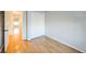 Bright bedroom with wood floors and mirrored closet doors at 2786 E 118Th Cir, Thornton, CO 80233