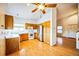 Spacious kitchen featuring wood cabinets, stainless steel appliances, and hardwood floors at 2786 E 118Th Cir, Thornton, CO 80233