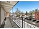 Spacious balcony overlooking pool area, perfect for outdoor relaxation at 100 S Clarkson St # 304, Denver, CO 80209