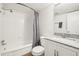 Bathroom featuring white subway tile and a vanity with a granite countertop at 100 S Clarkson St # 304, Denver, CO 80209