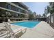 A relaxing community pool with ample lounge chairs and a well-maintained deck for relaxation at 100 S Clarkson St # 304, Denver, CO 80209