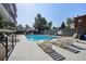 Community pool area with plenty of lounge chairs available for residents to bask in the sun at 100 S Clarkson St # 304, Denver, CO 80209