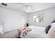 Spacious bedroom featuring lots of natural light, with simple furniture and accents at 5861 Mt Shadows Blvd, Firestone, CO 80504