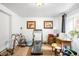 Bright, airy gym featuring a treadmill, bicycle, and ample space for a home workout area at 9045 W Ithaca Pl, Denver, CO 80235