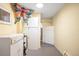 Practical storage room with built-in cabinets and shelving for maximum organization and efficiency at 9045 W Ithaca Pl, Denver, CO 80235