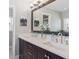 Modern bathroom with double vanity, stylish quartz countertops, and contemporary fixtures at 3138 E Otero Cir, Centennial, CO 80122