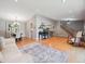 Open living space showing dining area, kitchen access, and a comfortable seating area at 3138 E Otero Cir, Centennial, CO 80122