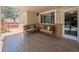 Covered patio featuring a seating area with comfortable benches and decorative pillows for relaxing at 3138 E Otero Cir, Centennial, CO 80122