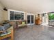 Spacious covered patio with ample seating, and an outdoor kitchen for outdoor enjoyment at 3138 E Otero Cir, Centennial, CO 80122