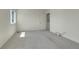 This bedroom boasts plush gray carpeting and recessed lighting at 45840 Laceleaf Dr, Bennett, CO 80102