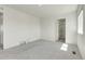 This bedroom boasts plush gray carpeting and recessed lighting at 45840 Laceleaf Dr, Bennett, CO 80102