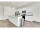 Clean kitchen with stainless steel appliances, modern countertop, and plenty of storage space at 45840 Laceleaf Dr, Bennett, CO 80102