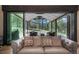 Serene view of a covered outdoor patio with comfortable seating, perfect for enjoying the surrounding nature at 18330 Archers Dr, Monument, CO 80132
