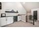 Stylish bar area with a beverage fridge, custom cabinets, and a view overlooking the lower level at 18330 Archers Dr, Monument, CO 80132