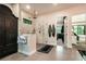 Bright bathroom with glass shower enclosure, dark wood armoire, and neutral color scheme at 18330 Archers Dr, Monument, CO 80132