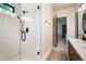 Modern bathroom featuring a glass enclosed shower with dual shower heads at 18330 Archers Dr, Monument, CO 80132