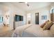 Cozy primary bedroom with a dresser and TV at 18330 Archers Dr, Monument, CO 80132