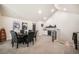Dining room featuring a table and chairs, bar area and vaulted ceilings with recessed lighting at 18330 Archers Dr, Monument, CO 80132