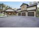 Stunning stone and stucco home with an oversized driveway and three-car garage at 18330 Archers Dr, Monument, CO 80132