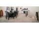 Entertaining game room featuring a custom bar, a round table, and unique decor at 18330 Archers Dr, Monument, CO 80132