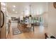 Bright kitchen featuring a kitchen island with breakfast bar and adjacent eating area at 18330 Archers Dr, Monument, CO 80132