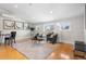 Well-lit living room featuring hardwood floors, neutral paint, and comfortable seating at 1065 Jackson St, Denver, CO 80206