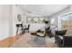Bright living room with hardwood floors, neutral decor, and stylish furnishings at 1065 Jackson St, Denver, CO 80206