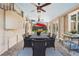 Covered patio featuring an outdoor dining area, a grill, and views of the backyard at 1065 Jackson St, Denver, CO 80206