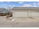 Attached two car garage with driveway at 2449 Xanthia St, Denver, CO 80238