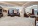 Spacious finished basement with comfortable seating and ample entertainment space at 23960 E Easter Pl, Aurora, CO 80016