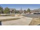 Charming home with a well-maintained front yard and a circular driveway at 23960 E Easter Pl, Aurora, CO 80016