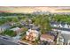 A bird's-eye view showing modern townhomes in a vibrant community close to the cityscape at 1048 Knox Ct, Denver, CO 80204