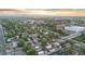 Expansive aerial view of the property showcasing the surrounding neighborhood and mountain views at 1048 Knox Ct, Denver, CO 80204