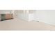 Basement living area with wet bar and neutral carpet at 1048 Knox Ct, Denver, CO 80204
