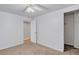 Neutral bedroom featuring carpet and closet space, with a view of the hall at 11835 W 37Th Pl, Wheat Ridge, CO 80033