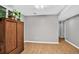 Bonus room with wood floors and a large cabinet, perfect for storage or hobbies at 11835 W 37Th Pl, Wheat Ridge, CO 80033