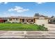 Charming single-story home with a well-manicured lawn, and a two car garage at 11835 W 37Th Pl, Wheat Ridge, CO 80033