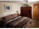 This comfortable bedroom includes a storage hutch and traditional decor at 2860 Ames St, Wheat Ridge, CO 80214