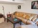 Cozy living room features a comfortable sectional couch and stylish decor at 2860 Ames St, Wheat Ridge, CO 80214