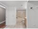 View of the bathroom with shower-tub combo from bedroom access at 10890 W Evans Ave # 1G, Lakewood, CO 80227