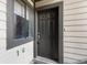 Exterior front door of unit 1G at 10890 W Evans Ave # 1G, Lakewood, CO 80227