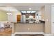 Charming eat-in kitchen with stainless steel appliances and breakfast nook at 10890 W Evans Ave # 1G, Lakewood, CO 80227