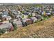 Aerial view of neighborhood with autumn foliage at 8379 Hackamore Rd, Littleton, CO 80125