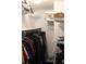 A closet that has storage and many hanging clothes at 8600 E Alameda Ave # 105, Denver, CO 80247