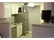 Stylish kitchen features stainless steel appliances and granite countertops at 8600 E Alameda Ave # 105, Denver, CO 80247