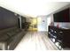 An open living room boasts wood floors and neutral colored walls at 8600 E Alameda Ave # 105, Denver, CO 80247