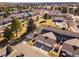 Aerial view of property and community with multiple amenities and beautiful landscaping at 7176 S Vine E Cir, Centennial, CO 80122