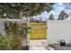 Backyard view of the yard and privacy fence between the properties at 7176 S Vine E Cir, Centennial, CO 80122