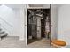 Utility closet shows water heater and furnace, as well as access to the basement space at 7176 S Vine E Cir, Centennial, CO 80122